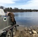 U.S. Fish and Wildlife Service personnel stock trout at Fort McCoy lakes