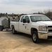 U.S. Fish and Wildlife Service personnel stock trout at Fort McCoy lakes