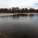 U.S. Fish and Wildlife Service personnel stock trout at Fort McCoy lakes