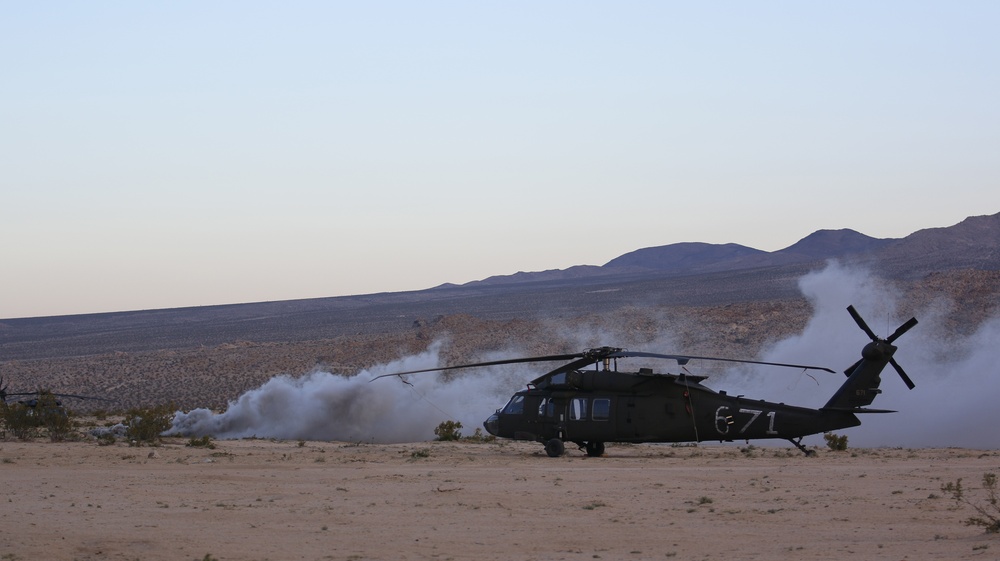 UH-60 Black Hawk helicopter with a smoke grenade