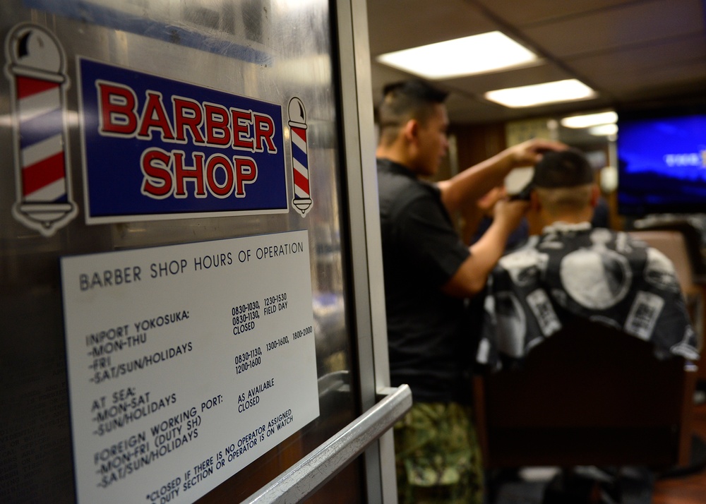 Blue Ridge Sailors work in the post office and barber shop.