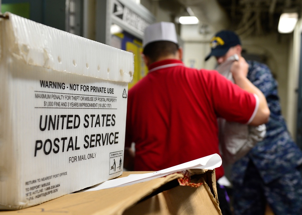 Blue Ridge Sailors work in the post office and barber shop.