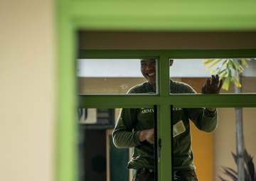 Balikatan 18: Multinational forces add finishing touches to building at Calangitan ES