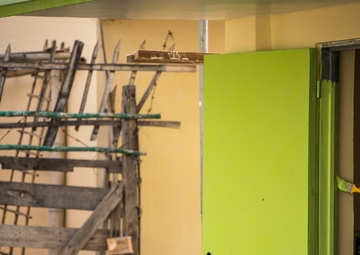 Balikatan 18: Multinational forces add finishing touches to building at Calangitan ES