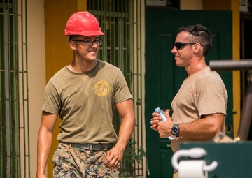 Balikatan 18: Multinational forces add finishing touches to building at Calangitan ES