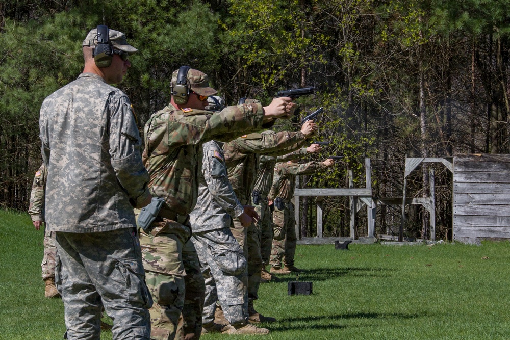 Soldiers Fire M9 Pistols