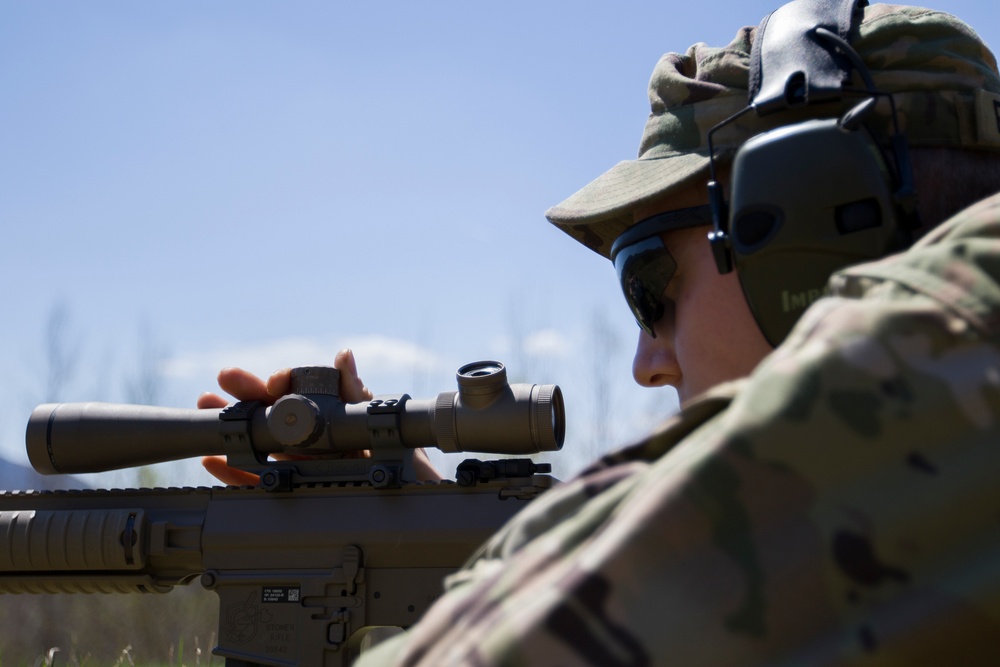 Soldier Adjusts Scope on M110