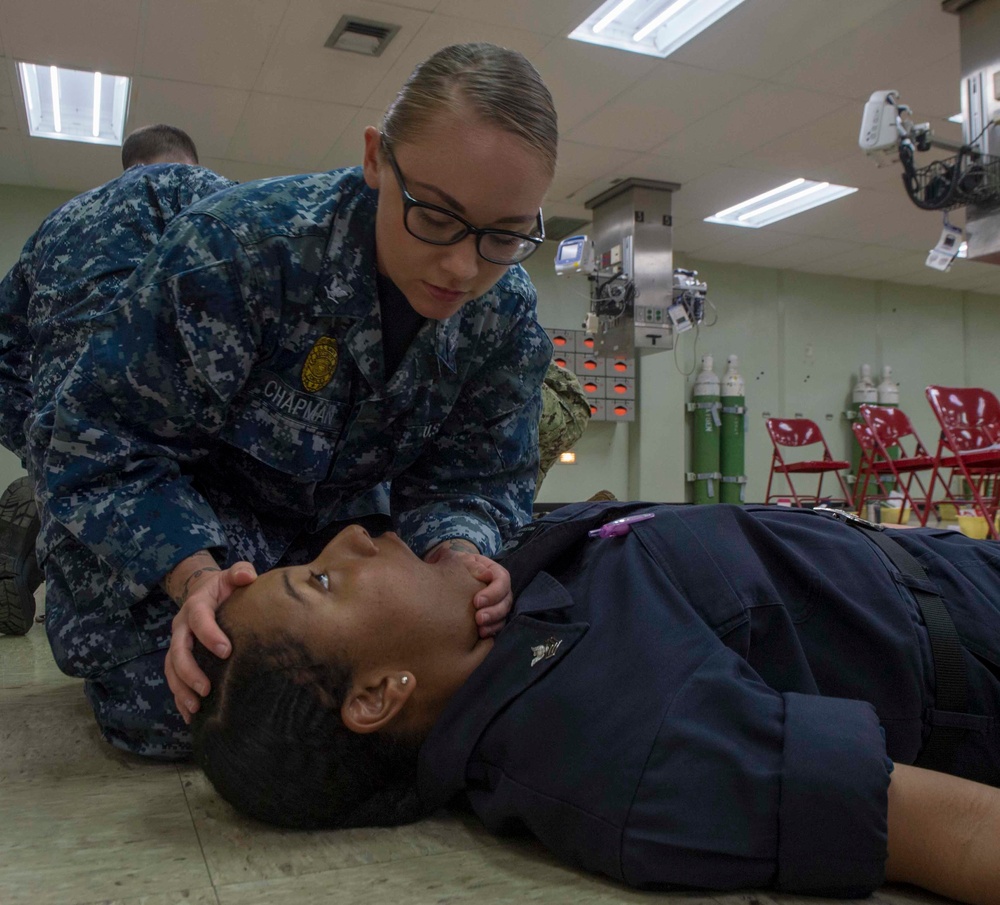 Sailors participate in TCCC aboard USNS Mercy