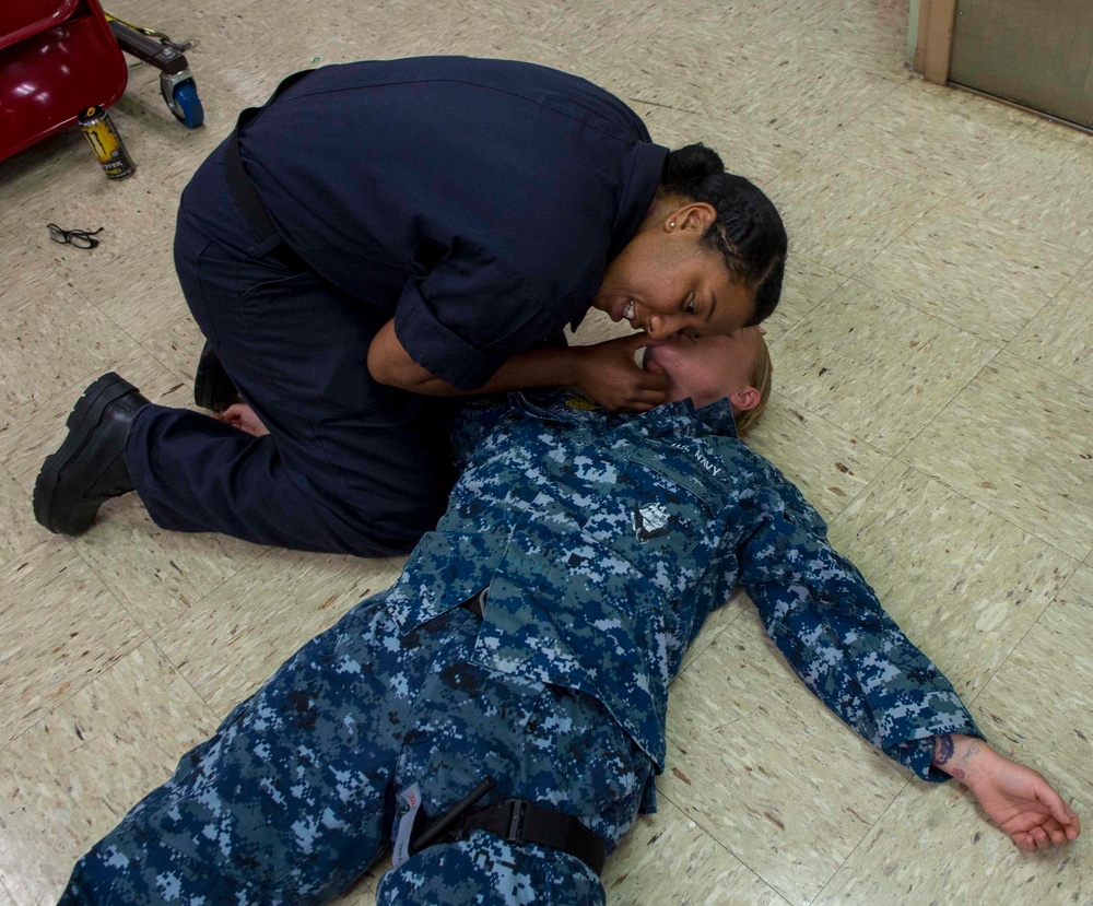 Sailors participate in TCCC aboard USNS Mercy