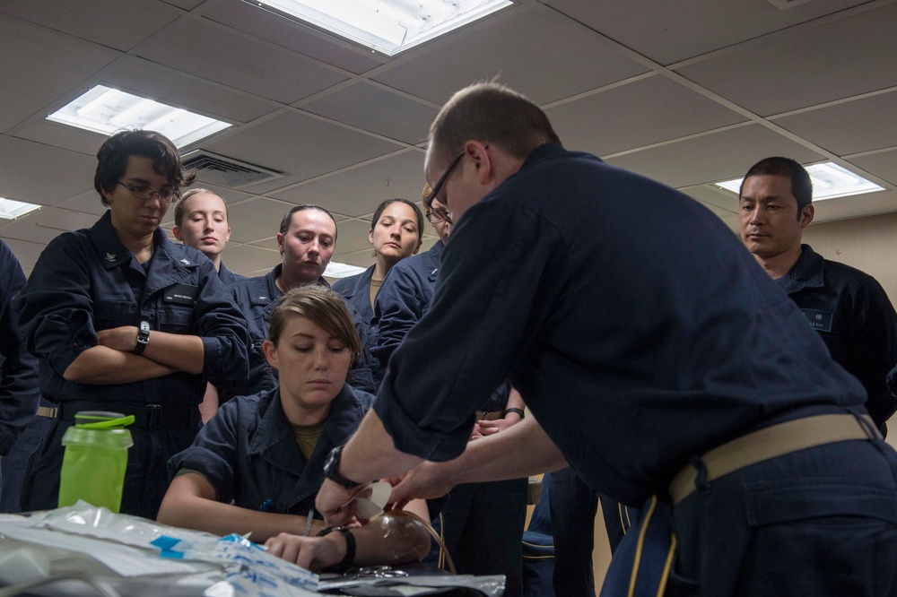 Sailors conduct a Wound Care Course aboard USNS Mercy