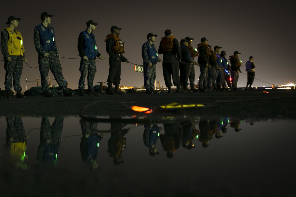 USS Gerald R. Ford (CVN78) nighttime replenishment at sea training