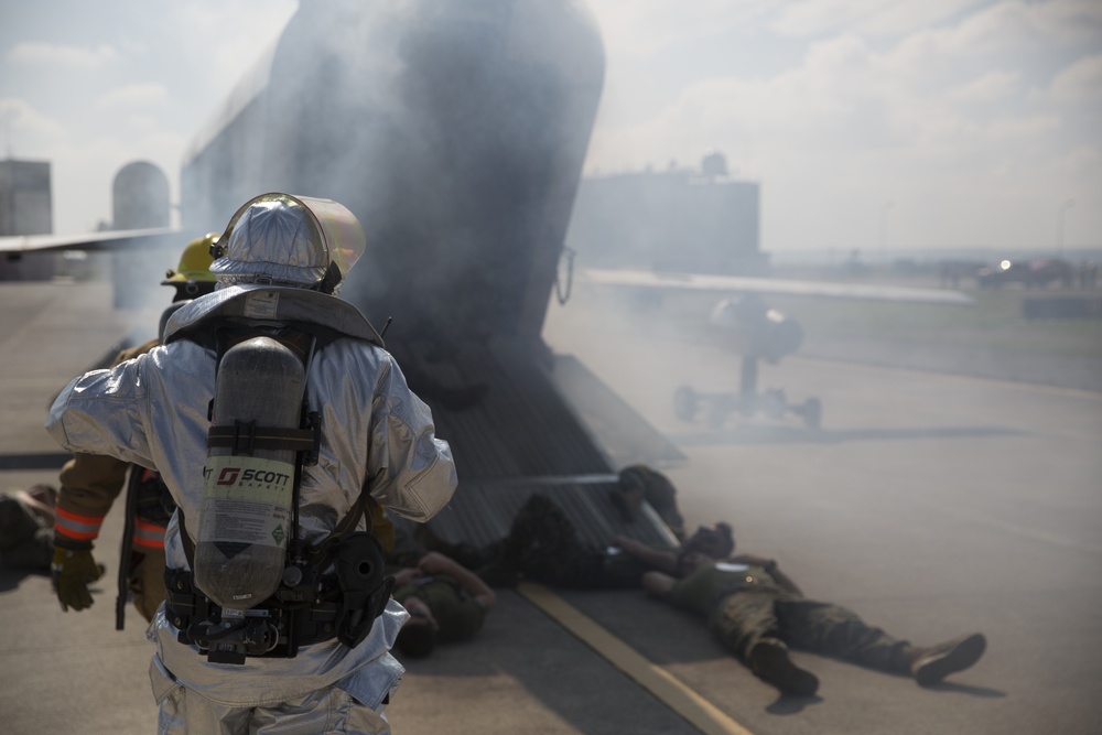 Up in smoke: Marines and Sailors practice Crash, Fire and Rescue training