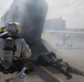 Up in smoke: Marines and Sailors practice Crash, Fire and Rescue training