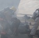 Up in smoke: Marines and Sailors practice Crash, Fire and Rescue training