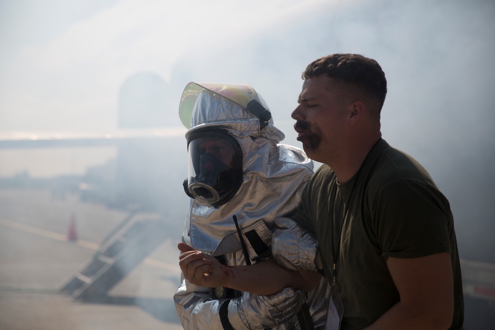 Up in smoke: Marines and Sailors practice Crash, Fire and Rescue training