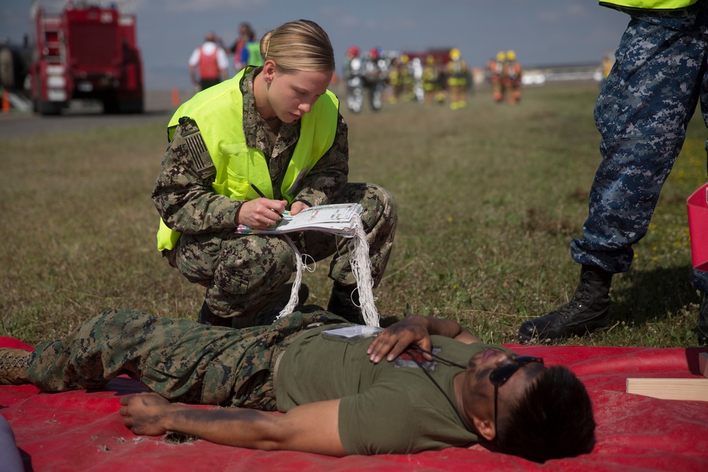 Up in smoke: Marines and Sailors practice Crash, Fire and Rescue training