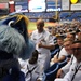 The Tampa Bay Rays Mascot poses with US Navy Sailors