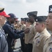 Service members aboard USNS Mercy particpate in a master chief petty officer promotion ceremony