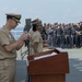 Service members aboard USNS Mercy particpate in a master chief petty officer promotion ceremony