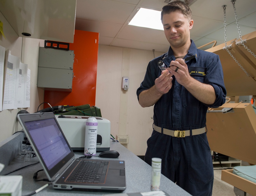 Sailors conduct routine water testing aboard USNS Mercy