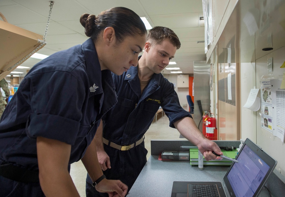 Sailors conduct routine water testing aboard USNS Mercy