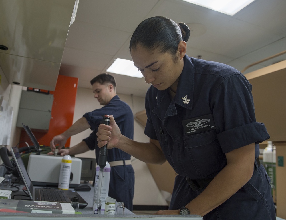 Sailors conduct routine water testing aboard USNS Mercy