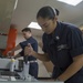 Sailors conduct routine water testing aboard USNS Mercy