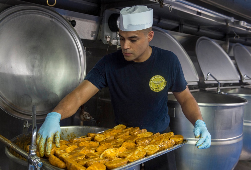 Sailors prepare for lunch aboard USNS Mercy