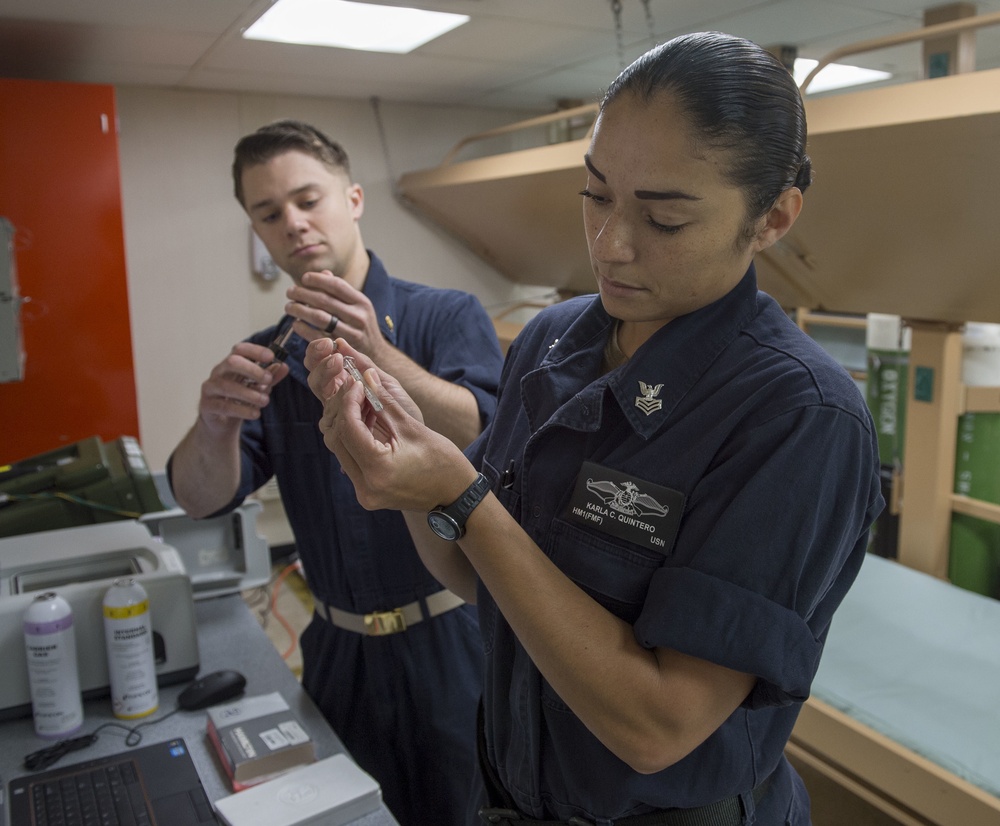 Sailors conduct routine water testing aboard USNS Mercy