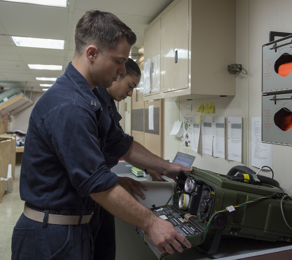 Sailors conduct routine water testing aboard USNS Mercy