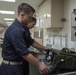 Sailors conduct routine water testing aboard USNS Mercy