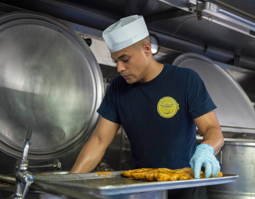 Sailors prepare for lunch aboard USNS Mercy