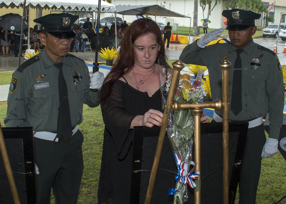 Guam Police Escort Widow