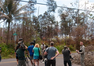 National Guardsmen escort news media through volcano stricken neighborhoods