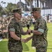 Sgt. Maj. Kasal passes on the sword of office