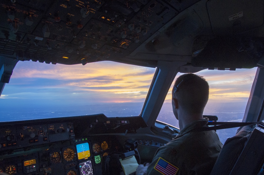 KC-10 flies over Australia at sunset
