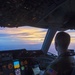 KC-10 flies over Australia at sunset