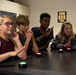 Airmen from legal lead teens in quiz game