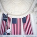 Arlington National Cemetery Employees Hang American Flags in the Memorial Amphitheater