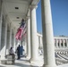 Arlington National Cemetery Employees Hang American Flags in the Memorial Amphitheater