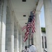 Arlington National Cemetery Employees Hang American Flags in the Memorial Amphitheater