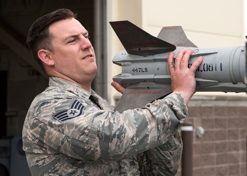 90th AMU wins 1st Quarter Wing Weapons Load Crew Competition