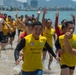 PP18 servicemembers join Vietnamese swimmers in a surf lifesaving event.