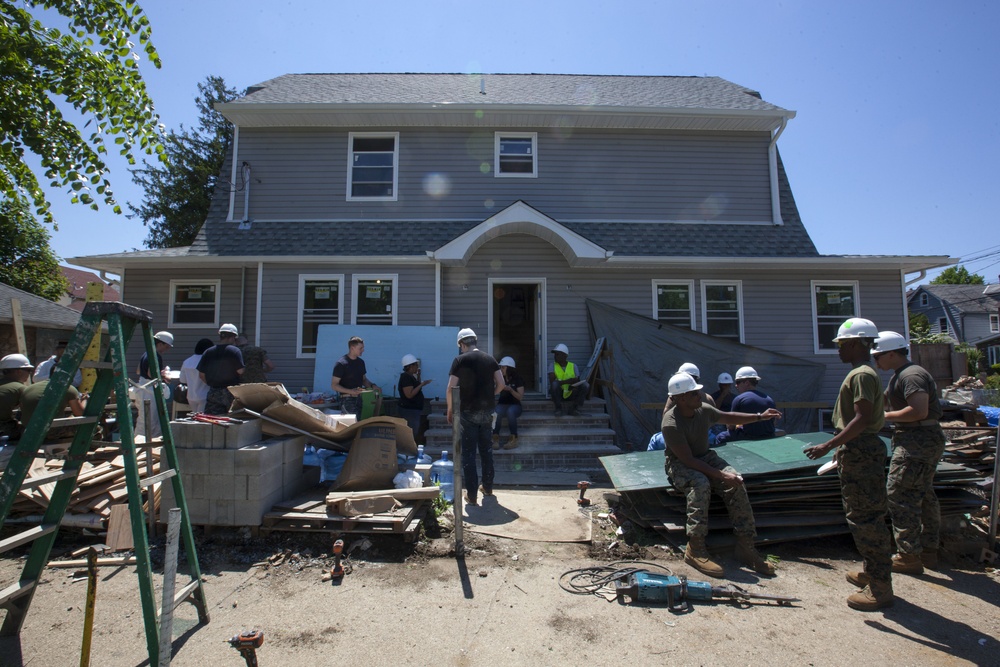 Habitat for humanity: service members refurbish houses in Queens