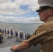 Marines and Sailors man the rails