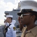 Marines and Sailors man the rails