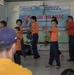 Service members participate in a community relations event at Khan Hoa Social Protection Center