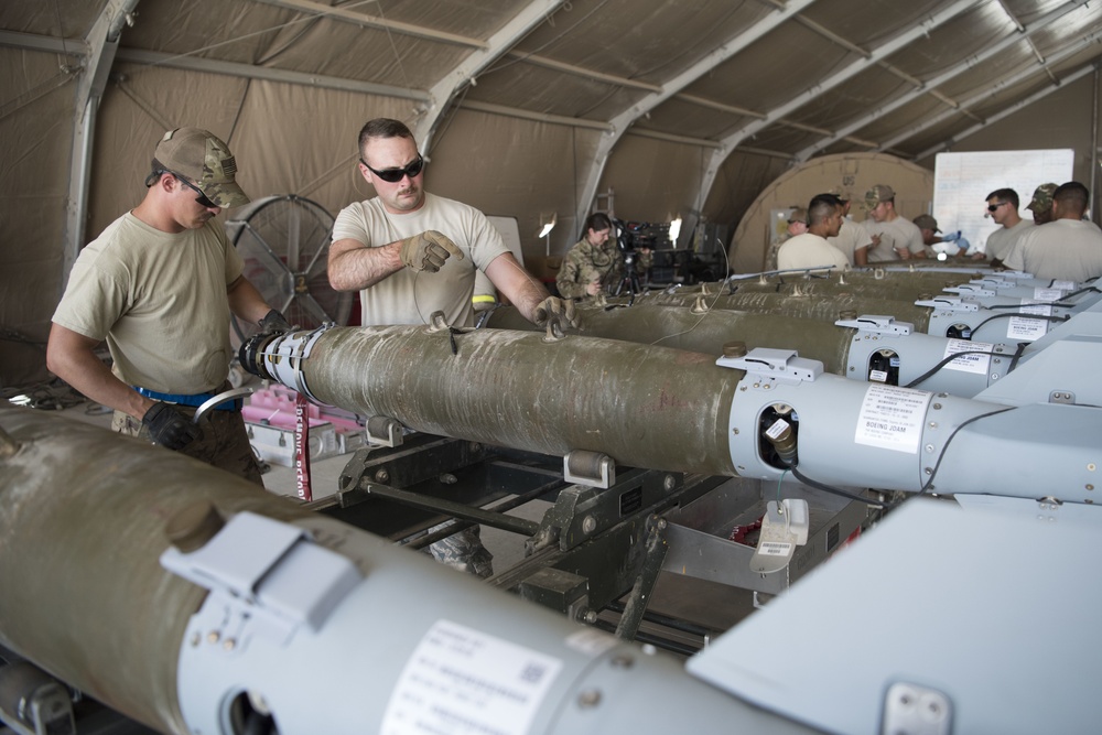 332nd EMXS Munitions Flight arms up F-15s