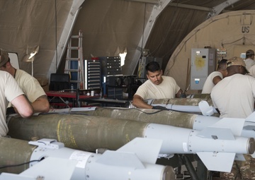 332nd EMXS Munitions Flight arms up F-15s