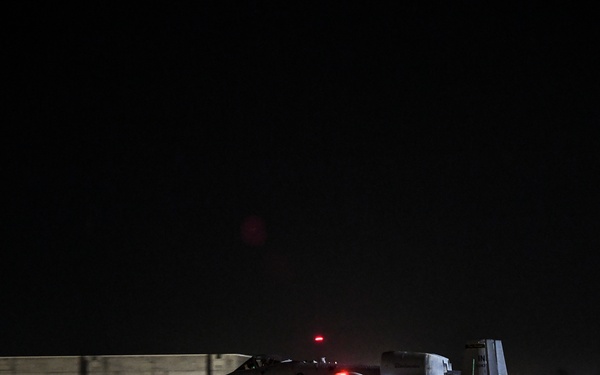 MQ-9 and A-10 taxi Kandahar flightline